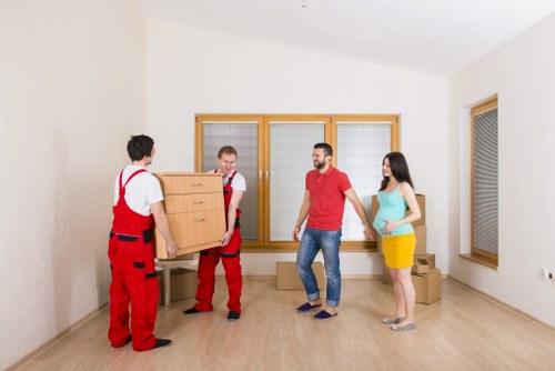 Careful loading of furniture into a removal vehicle for a local move