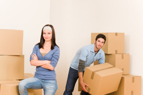 Packed boxes and protected furniture ready for a Southhackney flat removal